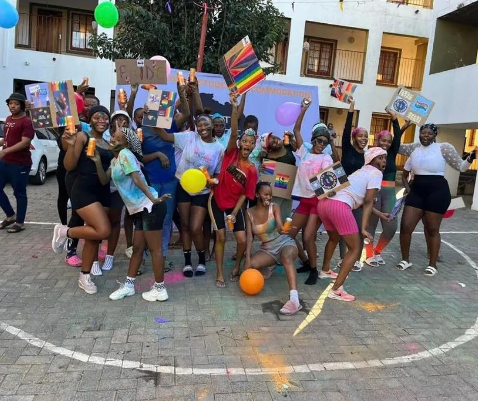 Residents celebrating together in a Varsity Lodges courtyard